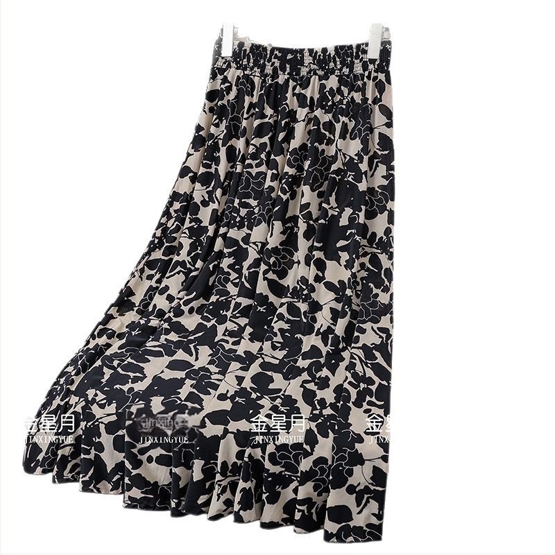 A-vonalú midi szoknya, hosszú, virágos mintázat, Ice Silk, 70–80% viszkóz, enyhe nyújthatóság, 2025 nyár