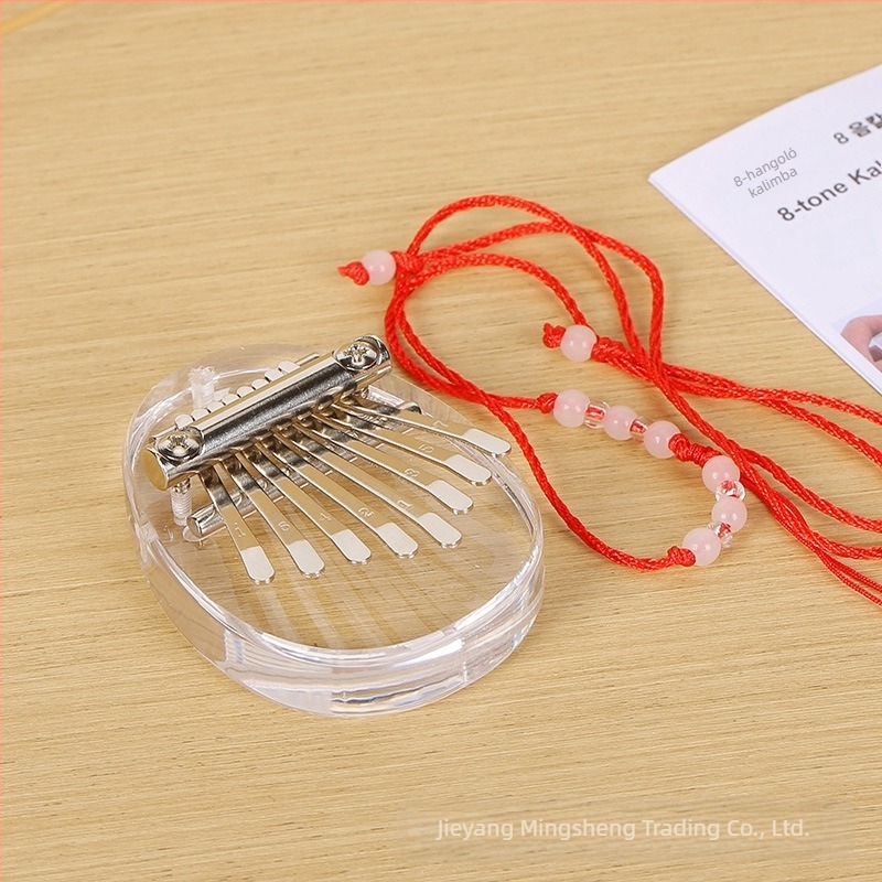 Kalimba Ruzik 816 — csomagolás: kartondoboz nyakpánttal és használati útmutatóval; hangszer a zenei eszközök számára (Márka: Ruzik; Modell: 816; Csomagolás: kartondoboz, nyakpánt, használati útmutató; Alkalmazási terület: zenei hangszerek)