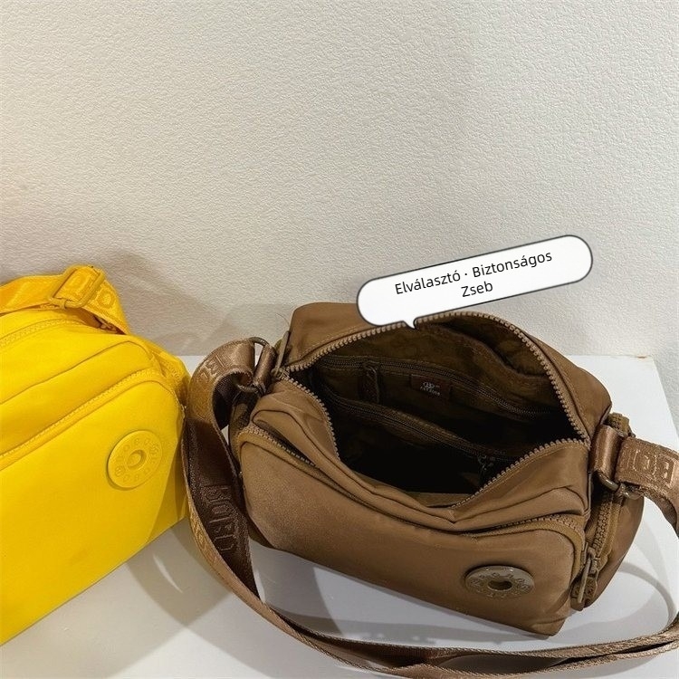 Bou bou vállon átvet táska, Oxford anyag, horizontális négyzet alak, cipzáras záródás, belső zsebek telefon és személyi igazolvány számára