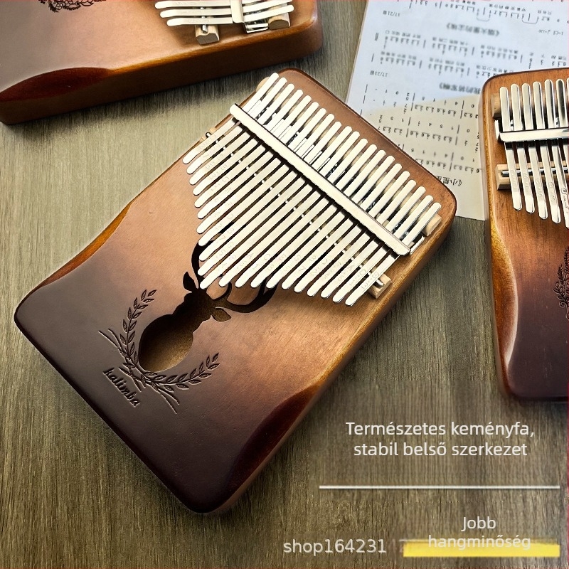 Fából készült kalimba (ujj-piano), 17 vagy 21 hang, 21 lyuk, barackfa mag, tonalitás C