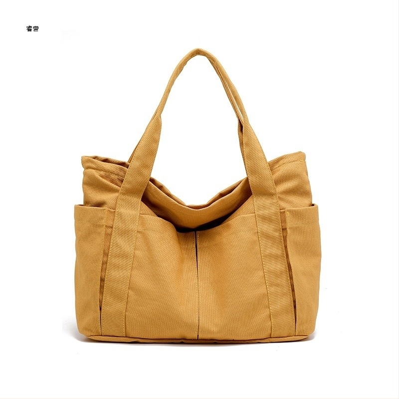 Diáktáska vászonból — városi egyszerűség stílus, vászon anyag, vízszintes négyzet alakú, cipzáras nyílás, belső telefontartó zseb