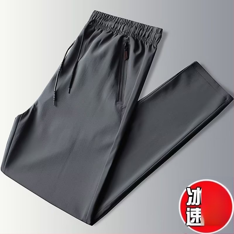 Férfiaknak lazán szabott ice-silk nadrág, crop hossz, középmagas derekú, cipzáros díszítés