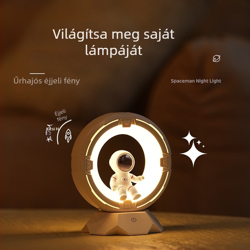 Éjszakai fény lány szobájába tervezve űrhajós dizájnnal, PC lámpabúra, beépített Akkumulátor, érintéses kapcsoló (Típus: Éjszakai fény; Dizájn: Űrhajós/Planéta; Lámpabúra anyaga: PC; Áramellátás: Beépített akkumulátor; Kapcsoló: Érintéses)