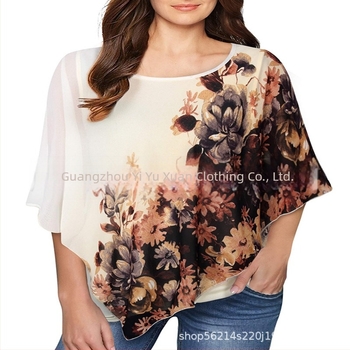 Chiffon anyagú felső nyomott mintával, laza szabás, kerek nyakú, bat-szárnyú ujjak, hossz 50–65 cm