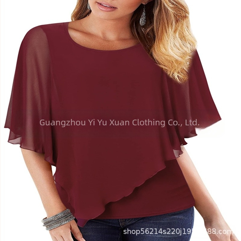 Chiffon anyagú felső nyomott mintával, laza szabás, kerek nyakú, bat-szárnyú ujjak, hossz 50–65 cm