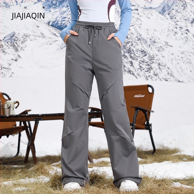 Női cargo nadrág téli, egyenes szabású, magas derekú, 95% poliészter anyagú, fehér kacsa pehely töltet