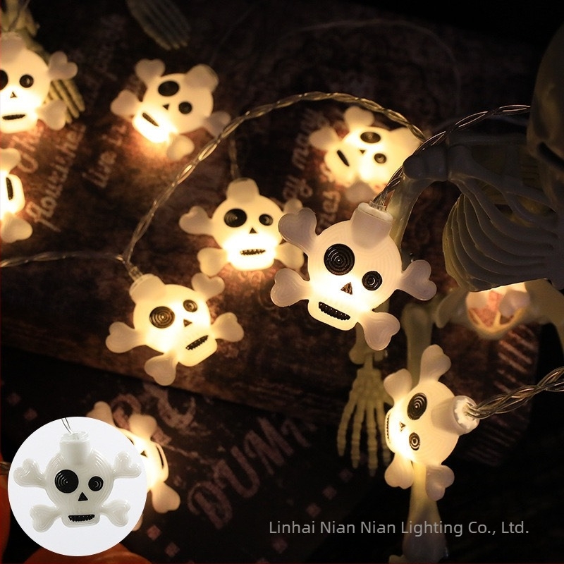 Halloween LED girland világítás koponya, denevér, sírköv és szellem motívumokkal hátborzongató dekorációhoz