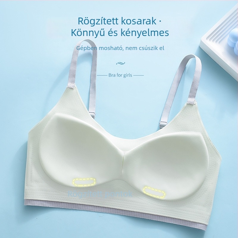 Lányoknak készült 3/4 kosaras melltartó-vest, fő anyag nylon, kosár pamutból formázott, bélés spandex 30%-ig, nincs merevítő, fixált dupla vállpántok, lélegző tartás és hátsó formázás