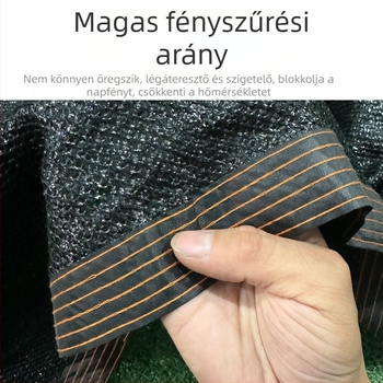Fekete árnyékoló hálóval és tetővel ellátott trambulin