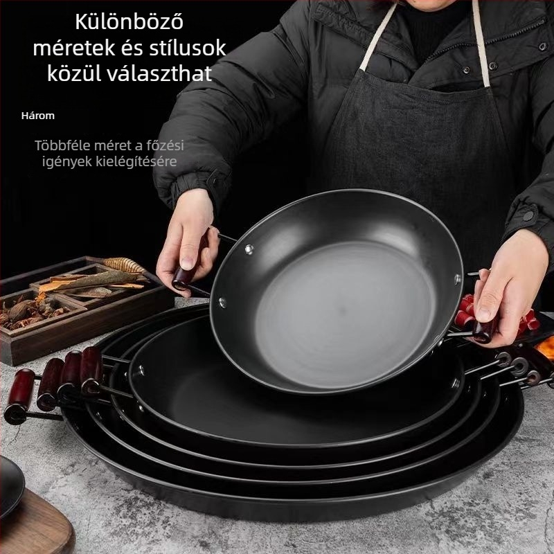 Kovácsoltvas serpenyő bevonat nélkül, két füllel, sík aljjal, gáztűzhelyhez és indukciós főzőlaphoz.