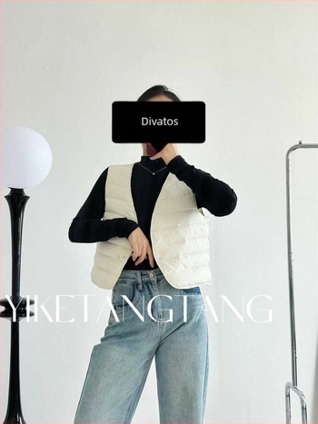 Női pehely mellény V-nyakú, fehér libatollal 86–90%, nagy méret, közepes vastagság, egyszerű elülső záródás, hossz 50–65 cm