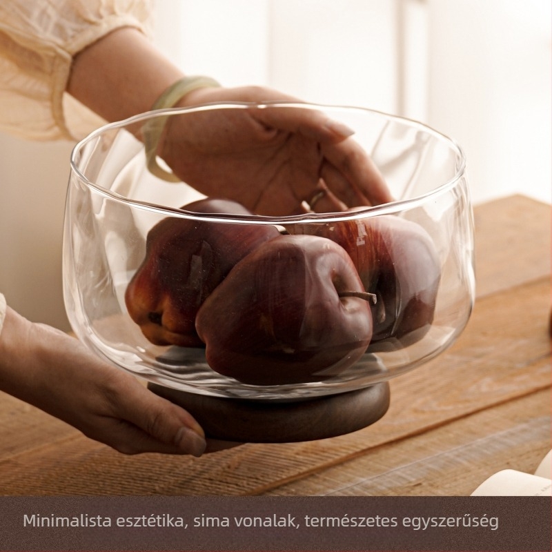 Üveg gyümölcstál magas tartóval a nappaliba, egyszerű stílus