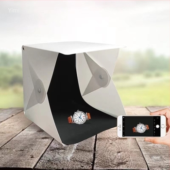 Kompakt fotózási fénybox termékfotózáshoz, árnyékmentes mini stúdió ékszerekhez és kis figurákhoz, kézi működtetés.