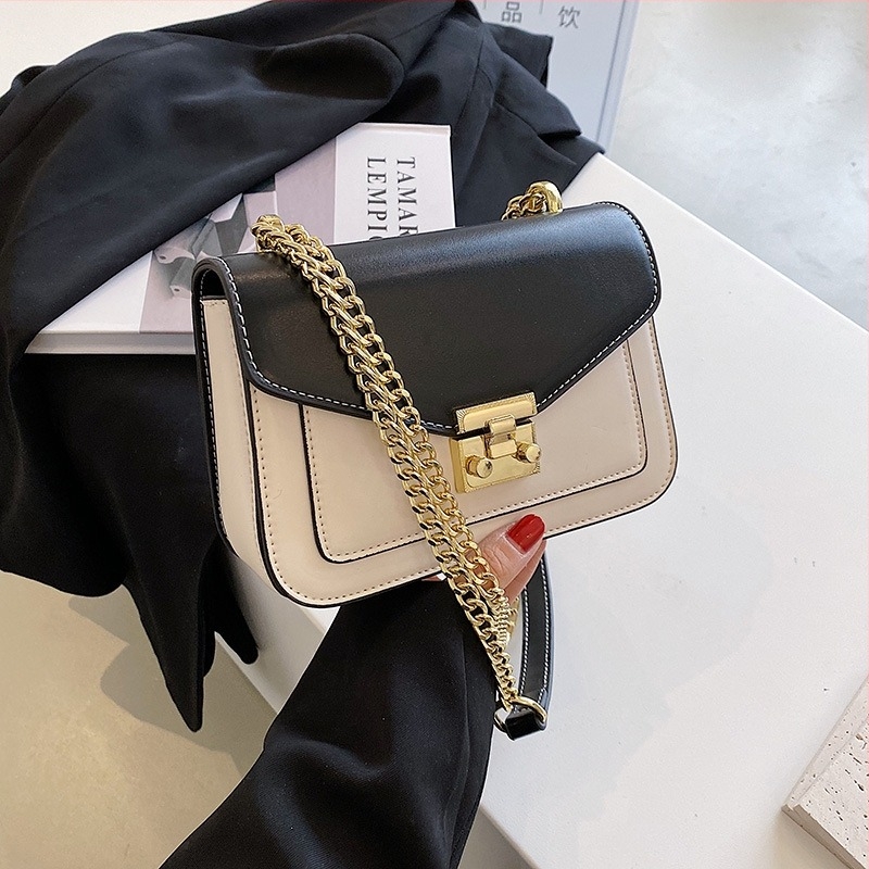 Női vintage stílusú keresztpántos láncos táska, PU anyag, vízszintes négyszögletes forma, fedéllel, egy vállpánt