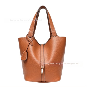 Vödör alakú táska PU anyag, puha, poliészter bélés, felső nyitás (PU anyag; vödör alak; puha; poliészter bélés; felső nyitás)