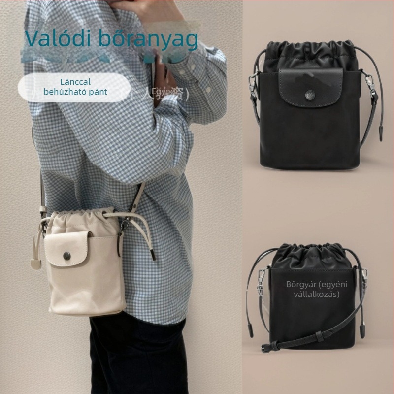 Húzózsinóros Bucket Bag valódi bőrből (top-grain cowhide), cilindrikus forma, rejtett cipzáros zseb