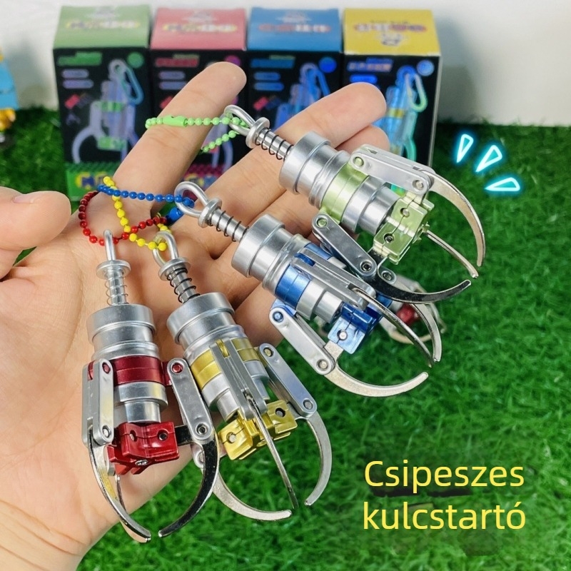 Mini karmás gép kulcstartó – autómedál, műanyag, stresszoldó játék, ajándékötlet