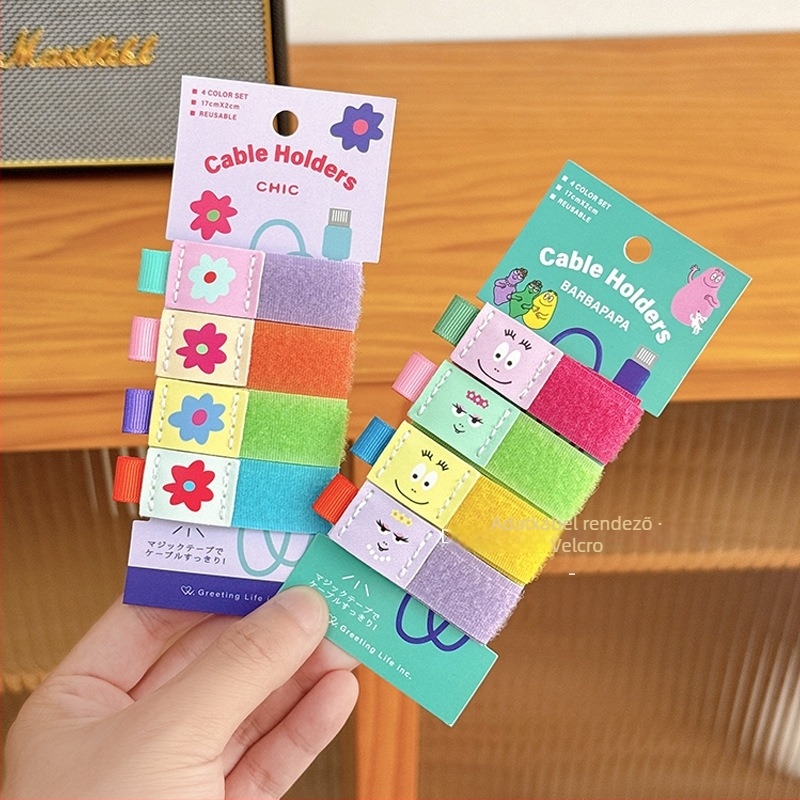 Kábeltartó aranyos karikatúra dizájnnal, Velcro záró, adat-, számítógép- és fejhallgató kábelekhez; Lemon book; 2025-ös megjelenés