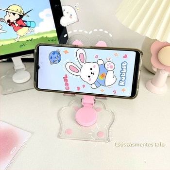 Áttetsző, rajzfilmszerű asztali állvány mobiltelefonokhoz és tabletekhez