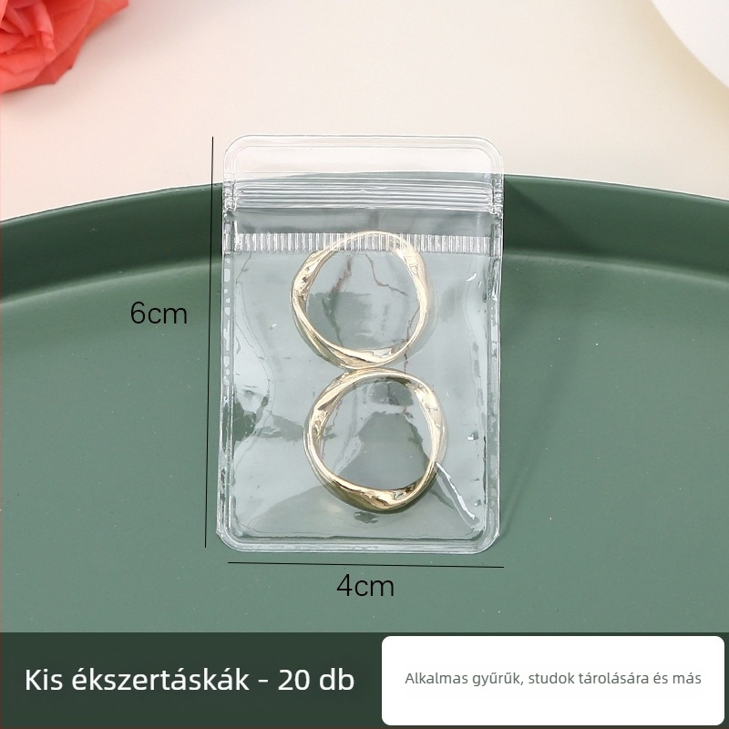 Ékszertároló doboz fülbevalók, gyűrűk és nyakláncok számára (PVC; többfunkciós, hordozható, porálló, oxidáció elleni védelem) asztali használat, 1 réteg, utazási tárolás