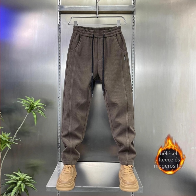 Férfi sportos, lazább nadrág fleece béléssel, pamut-poliészter keverék, 91–95% poliészter, középmagas derék, fűzővel záródó, mikro-elasztikusság