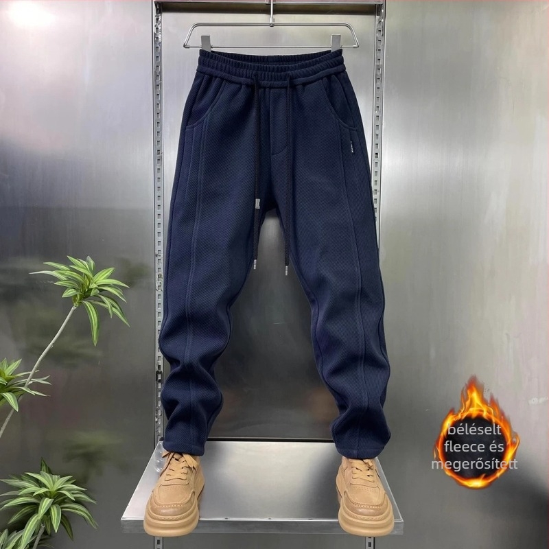 Férfi sportos, lazább nadrág fleece béléssel, pamut-poliészter keverék, 91–95% poliészter, középmagas derék, fűzővel záródó, mikro-elasztikusság