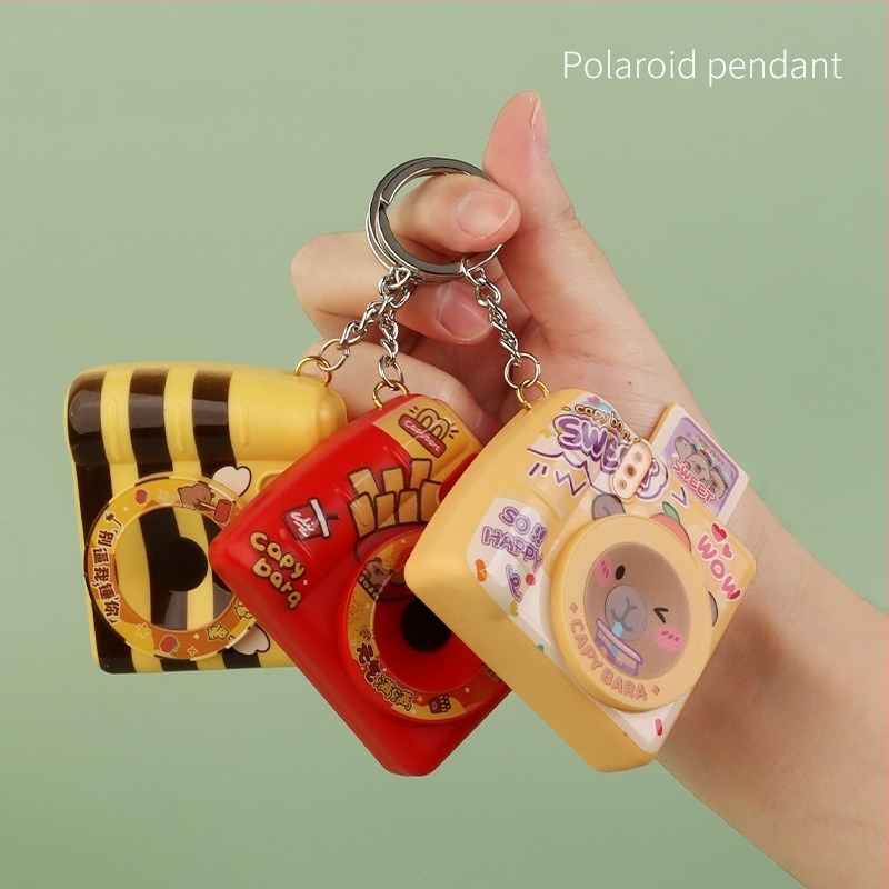 Kulcstartó játék tengerimalac és világító Polaroid kamera, Three Kids, műanyag, aranyos stílus