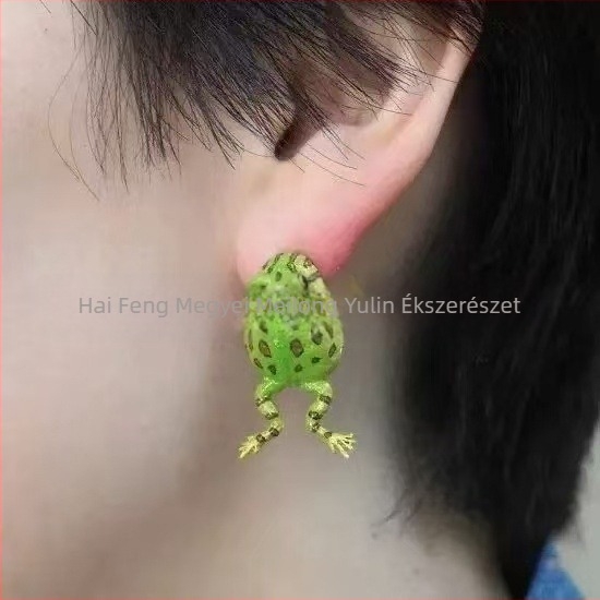 Béka fülklipsz – réz, rajzfilmszerű stílus, felület csepegtető olajjal, 2024 nyári kiadás