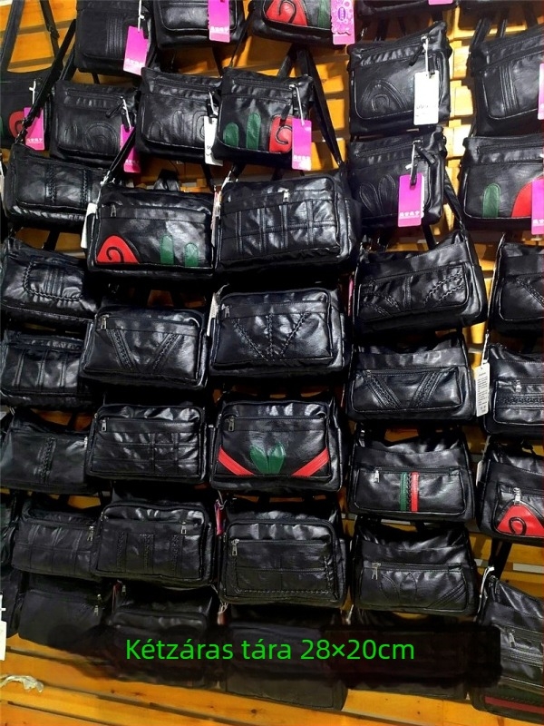 Női PU oldaltáska — vízszintes négyszög alak, cipzáras záródás, poliészter bélés, belső zsebek: cipzáras zseb, telefonzseb, személyi igazolvány zseb, kamera zseb