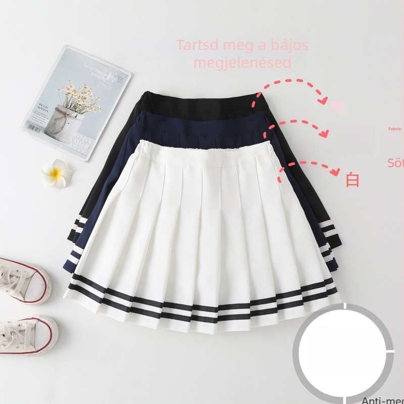 Gyerekeknek szánt pliszírozott, magas derekú A-vonalú JK stílusú szoknya csíkos mintával. Anyag: pamut-poliészter keverék; fő anyag 88% poliészter; bélés 71–80% poliészter.