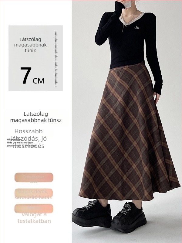 Középmagasságú, magas derekú esernyőszoknya csíkos/kockás mintával; poliészter anyag gyapjúkeverékkel és 30% alatti pamut tartalommal; mikro-elasztikusság; őszi-téli 2025