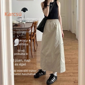 Egyszínű A-vonalú midi szoknya poliészterből, magas derékkal, elülső hasítékkal, poliészter tartalom 90–95%, tavasz 2025 megjelenés