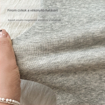 Flízes belső bélelésű harisnyanadrág bordázott mintával, szín zabpehely-tejfehér, függőleges csíkok, 9/10 hossz, őszi-téli viselet, kis testalkathoz