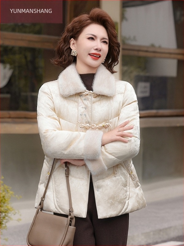 Elegáns téli női kabát, poliészter-pamut töltettel, virágmintás, műszőrmés gallér, laza szabású, kerek nyakú