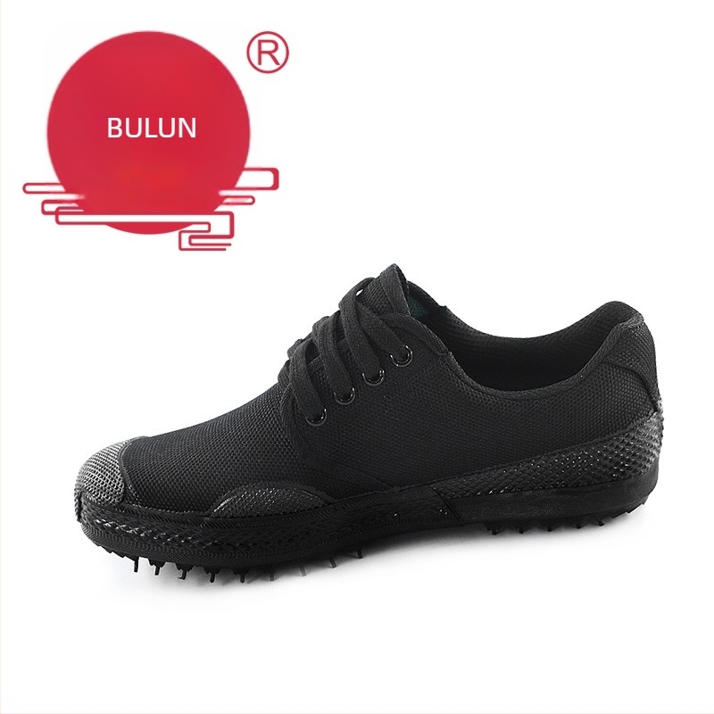 Szerszámipari cipő – Kamufláz vászonfelső, gumitalp, kerek orr, lélegző és ütéscsillapító.