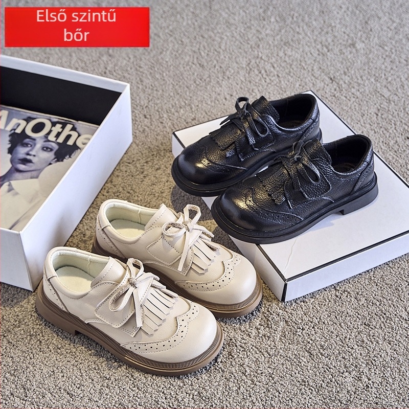 Gyermekek bőrből készült cipő: Felsőrész – első osztályú marhabőr; Talp – gumi; Zárás – Velcro; Belső anyag – háló; Stílus – édes akadémia