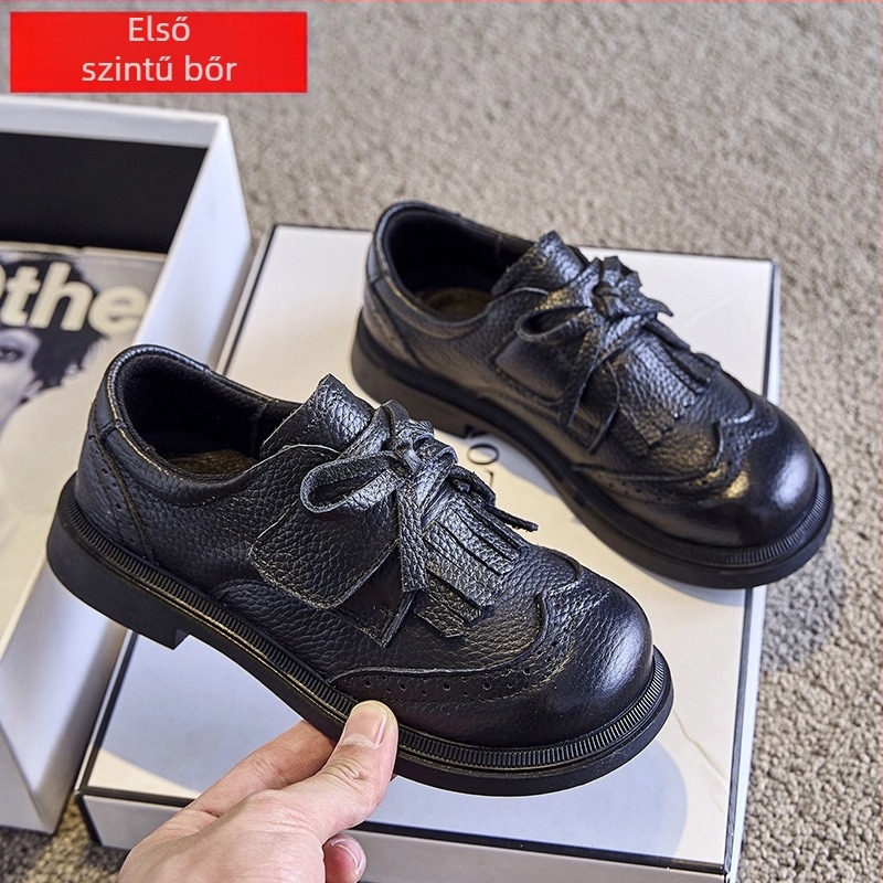 Gyermekek bőrből készült cipő: Felsőrész – első osztályú marhabőr; Talp – gumi; Zárás – Velcro; Belső anyag – háló; Stílus – édes akadémia