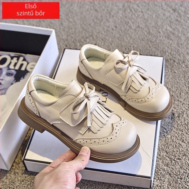 Gyermekek bőrből készült cipő: Felsőrész – első osztályú marhabőr; Talp – gumi; Zárás – Velcro; Belső anyag – háló; Stílus – édes akadémia
