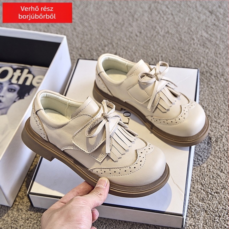 Gyermekek bőrből készült cipő: Felsőrész – első osztályú marhabőr; Talp – gumi; Zárás – Velcro; Belső anyag – háló; Stílus – édes akadémia