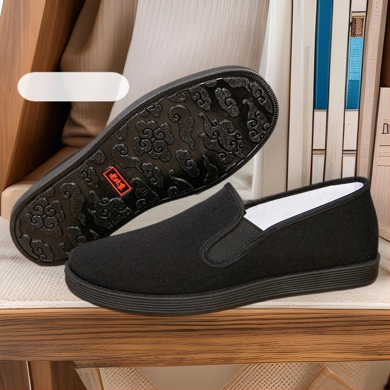 Férfi vászoncipő kerek orrú, alacsony felső rész, elasztikus zárás, textil belső talp, gumírozott talp