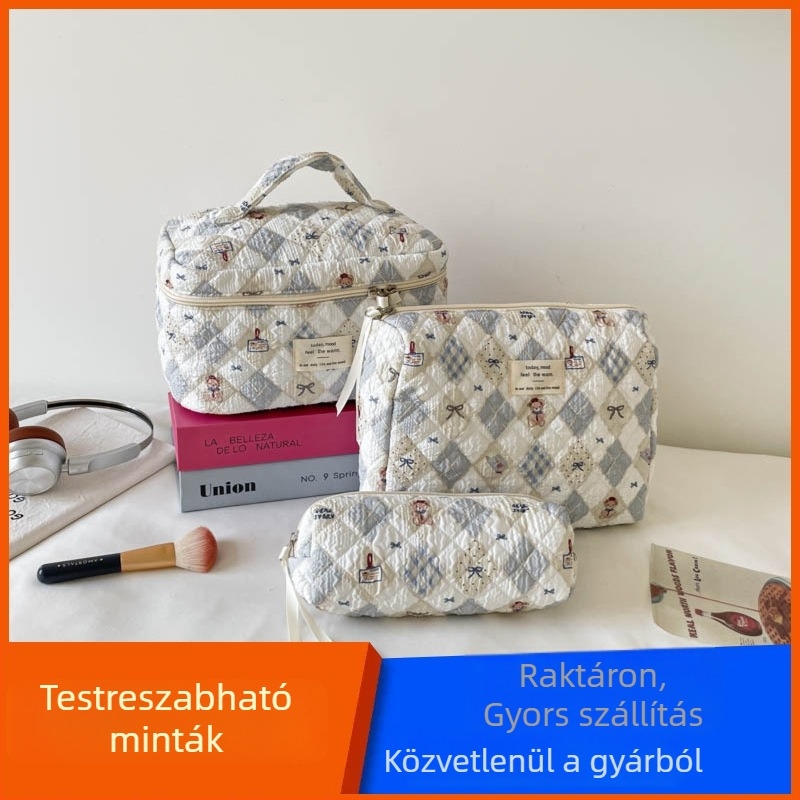 Koreai stílusú sminktáska buborékos textúrájú anyagból, steppelt, nagy kapacitású, hordozható és puha