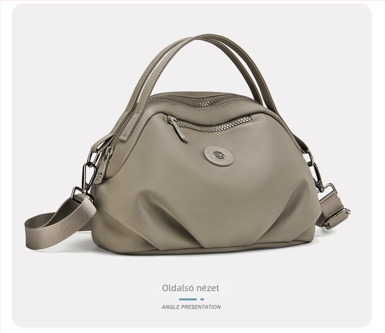 Női crossbody táska nylonból, városi minimalist stílus, ovális forma, cipzáras nyitás, belső cipzáras zseb