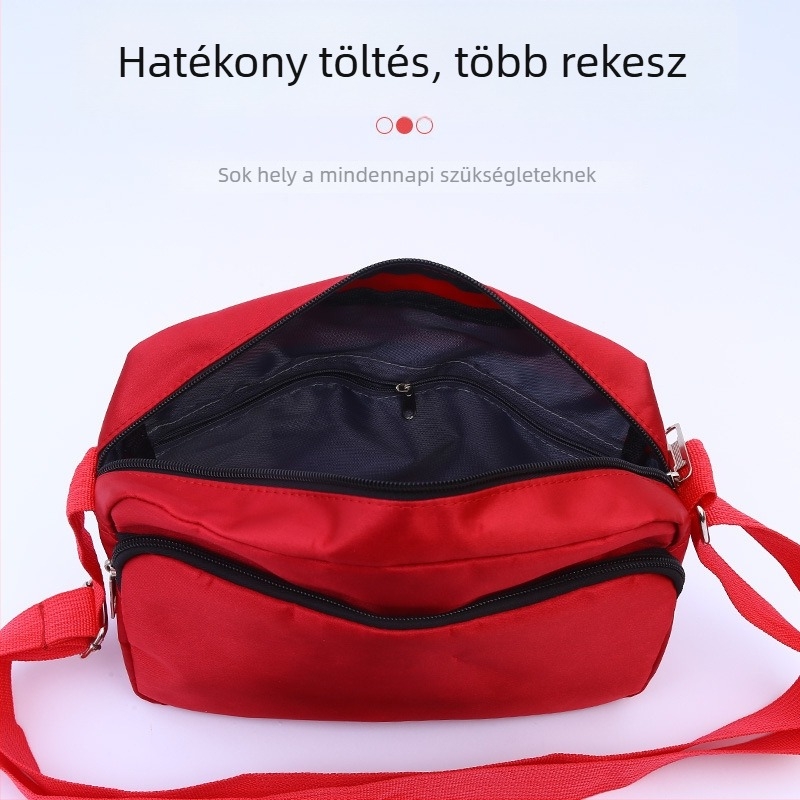 Oxford vászonból készült keresztpántos táska, vízszintes négyzet alakú, cipzáras nyitás, háromdimenziós külső