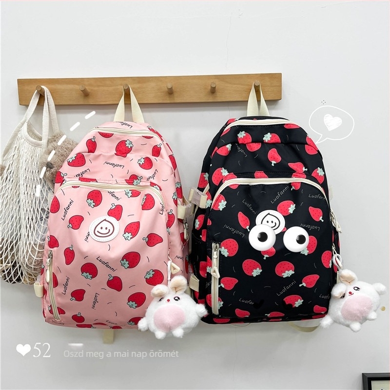 Iskolai lány hátizsák: eper mintás, koreai stílus; nylon anyag; ívelt vállpántok; könnyű, bővíthető, gerincvédelem
