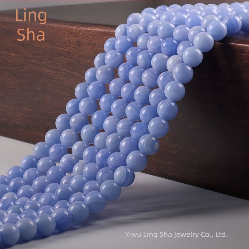 Szabad gyöngyök, szintetikus anyag, feldolgozás: vágás, csiszolás, polírozás és szintézis; termék kódja HH-ZMN-001; minta: szintetikus ametiszt kerek gyöngyök