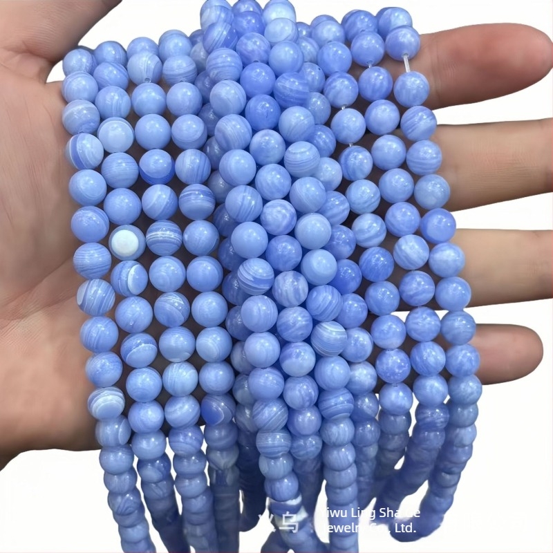 Szabad gyöngyök, szintetikus anyag, feldolgozás: vágás, csiszolás, polírozás és szintézis; termék kódja HH-ZMN-001; minta: szintetikus ametiszt kerek gyöngyök