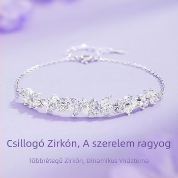 Női karkötő Wisteria Flower Smile dizájnnal, cirkón anyagú, elektroplatírozással bevonva, a Perfect Decoration márka; forma: virág-rombusz; stílus: hercegnő; kézrevaló kiegészítő.