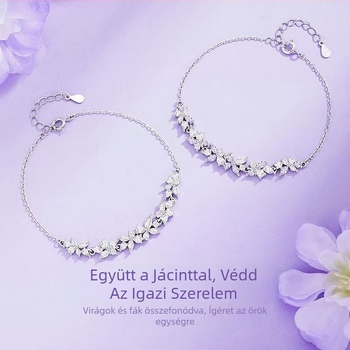 Női karkötő Wisteria Flower Smile dizájnnal, cirkón anyagú, elektroplatírozással bevonva, a Perfect Decoration márka; forma: virág-rombusz; stílus: hercegnő; kézrevaló kiegészítő.