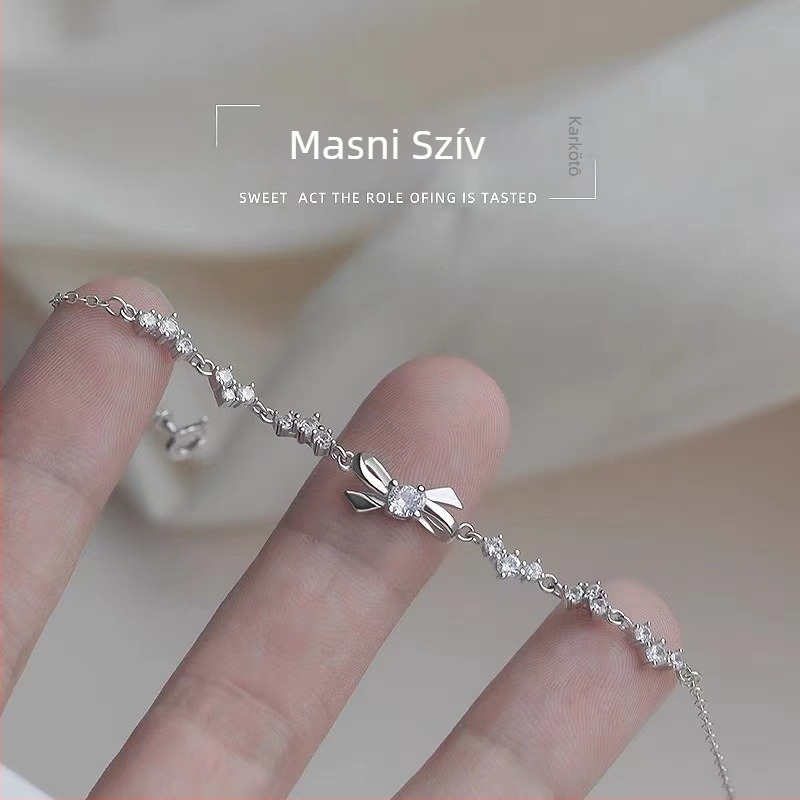 Női 925-ös ezüstbevonat karkötő masni mintával, gyémántdíszítéssel, divat ékszer, utazási ajándék
