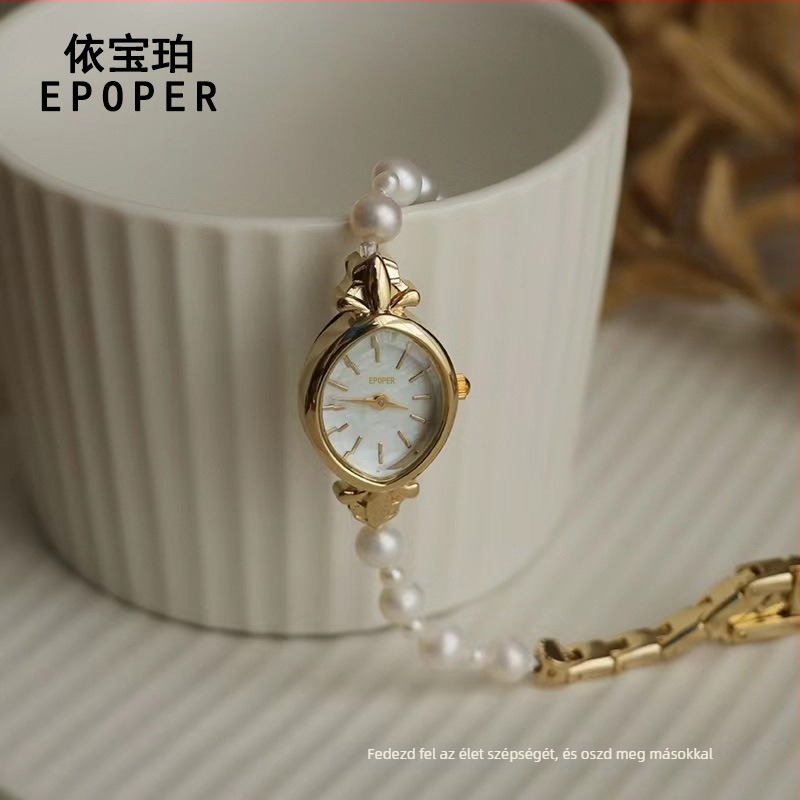 Női kvarcsos óra édesvízi gyöngy szíjjal, ovális fém tokkal, 30 m vízállóság